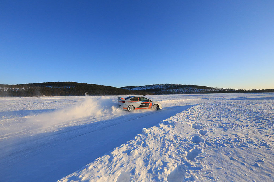 Attend a winter driving school and race authentic rally cars. Get a few tips from a multiple World Champion.