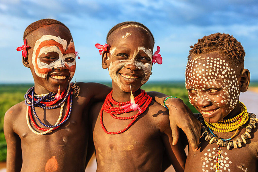 The Karo are famous for scarification and body painting. They would be happy to paint you, and treat you as a friend.