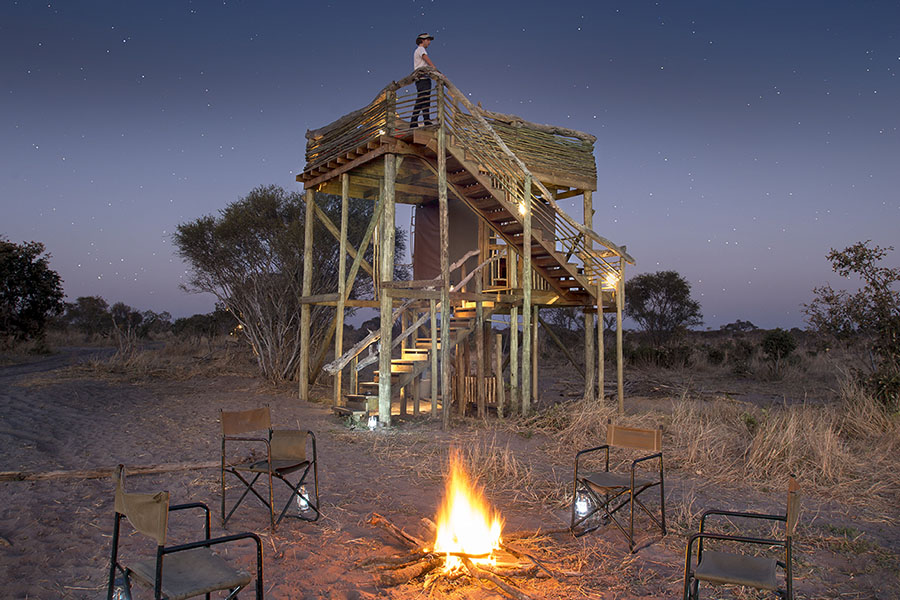 Share with friends and family around the fire, while elephants graze nearby.
