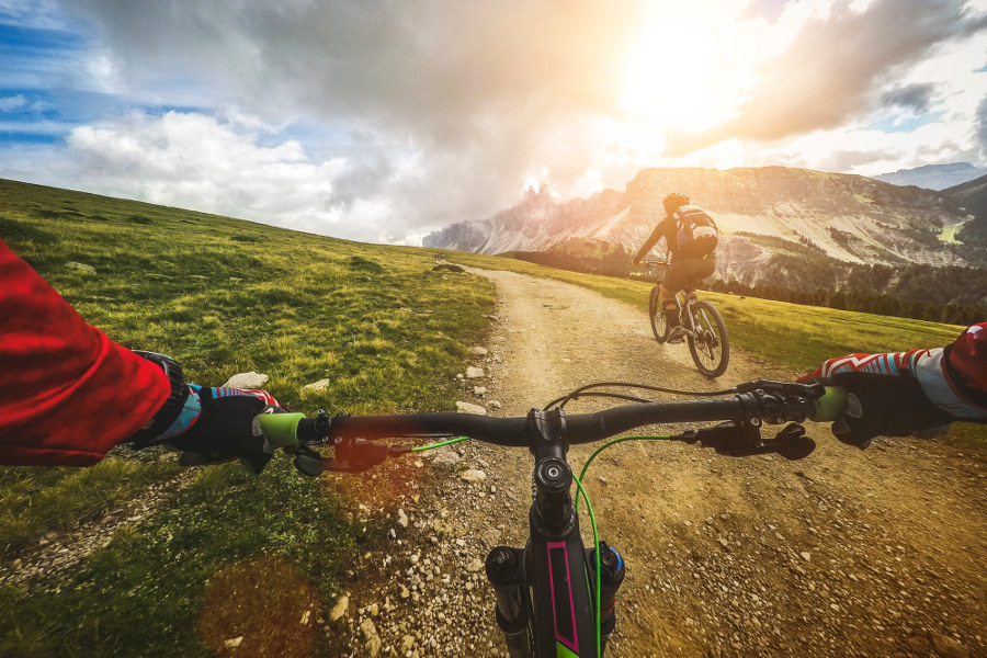 Hop on a mountain bike and combine the rush of the trails with the breathtaking mountain sights.