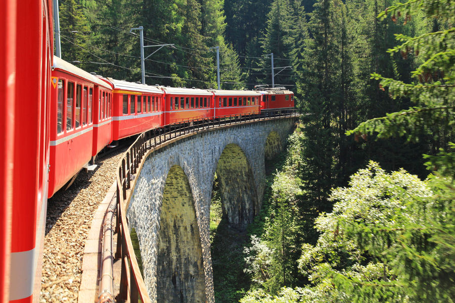 Travel mainly by train and enjoy the Swiss scenery from your first-class seats.