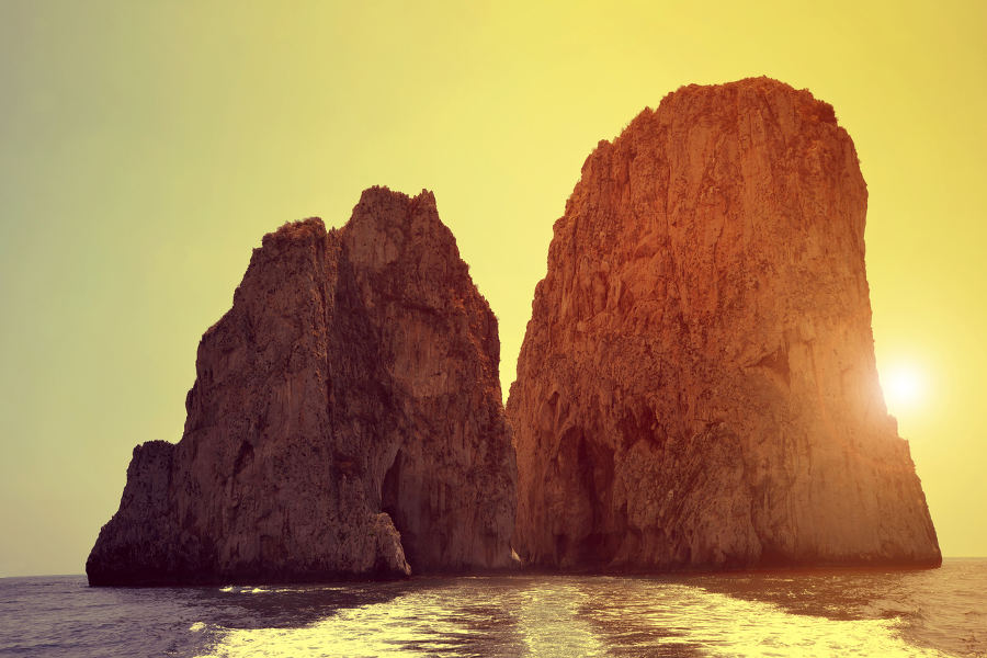 Be seduced by the Mediterranean and spend the night by the side of the faraglioni on your private boat.