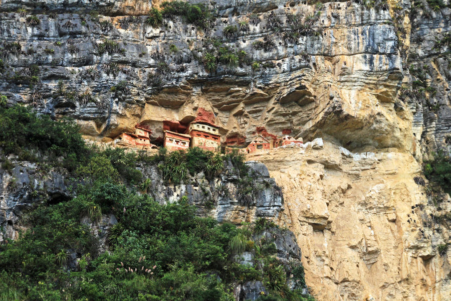 Hike in the cloud forest to discover the mysterious cliff-tombs of Revash.