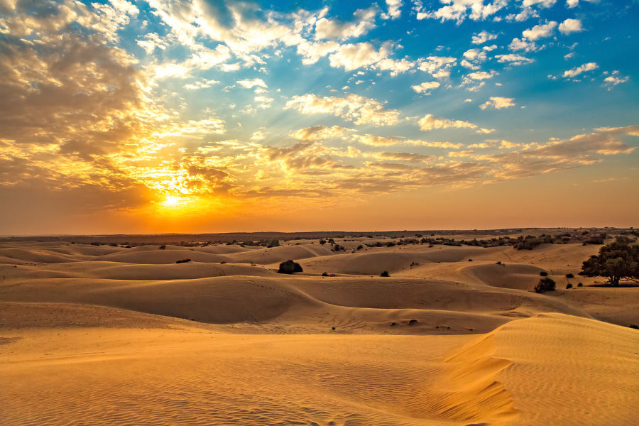 Stay in a luxury desert camp outside Jaisalmer. You will feel that time has stopped, and you have somehow been transported to a mythical age.
