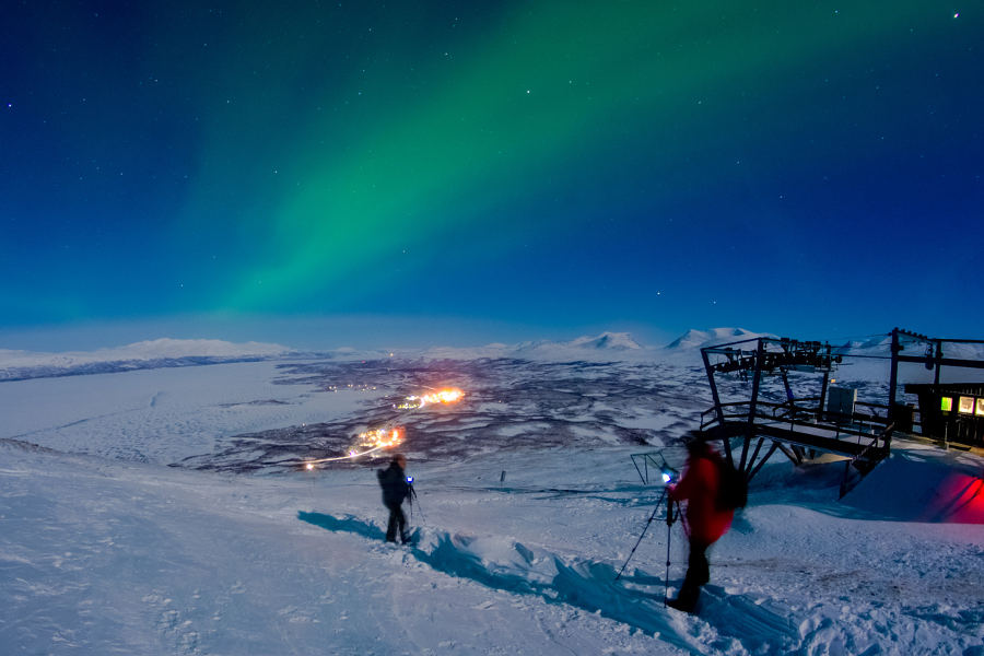 Enjoy a snowshoeing adventure in Abisko to enjoy the Aurora in the middle of the Arctic wilderness.