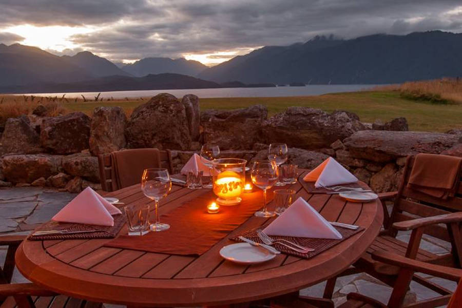 After a long day of hiking, relax and recharge your energy in an exclusive lodge by Lake Te Anau.
