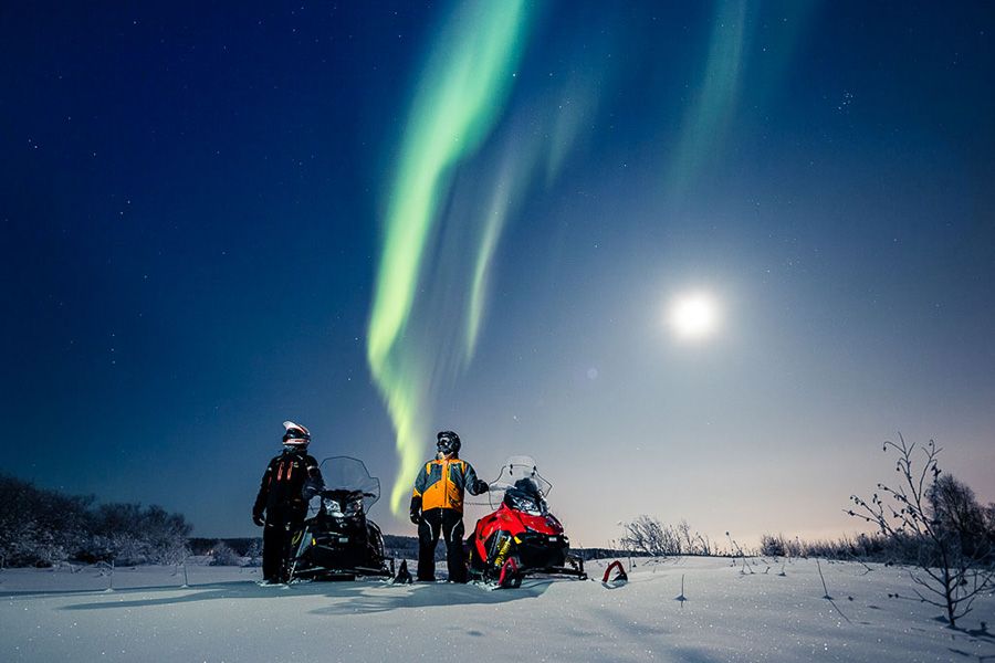 Ride a snowmobile to search for the Northern Lights, a truly magical accent to a perfect Christmas.